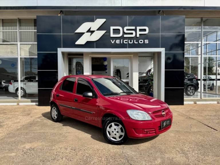 CHEVROLET - CELTA - 2010/2011 - Vermelha - R$ 25.900,00