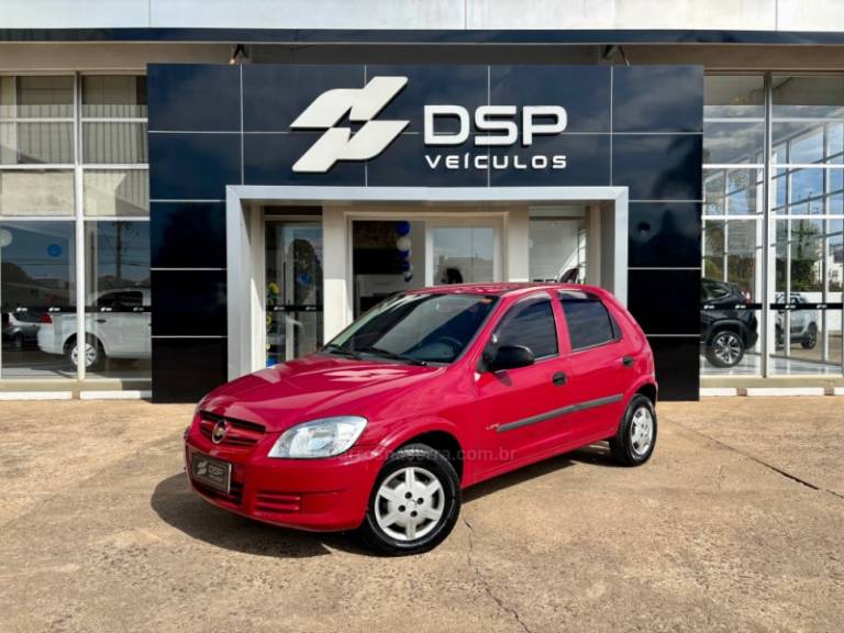 CHEVROLET - CELTA - 2010/2011 - Vermelha - R$ 25.900,00